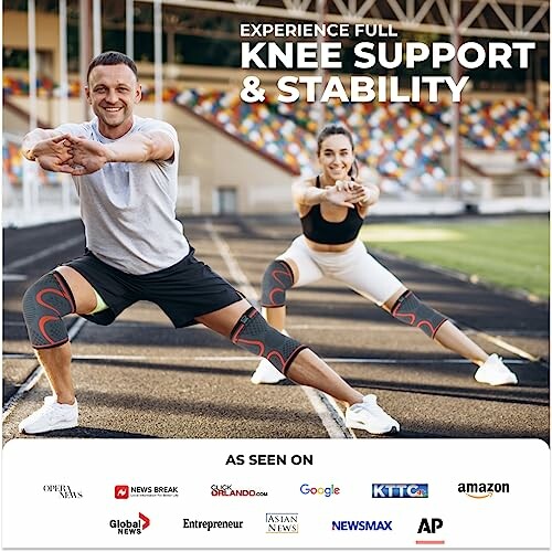 Two people exercising with knee support braces on a track field.