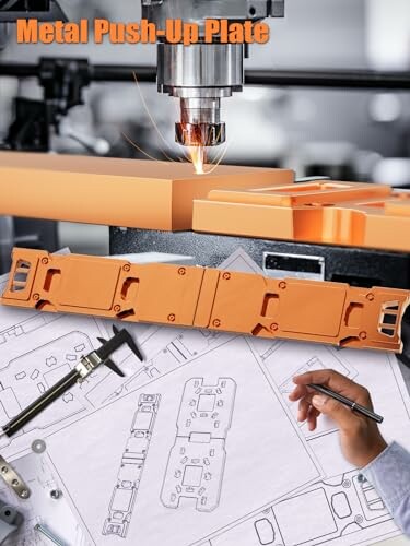 Metal fabrication setup with push-up plate and design blueprints.