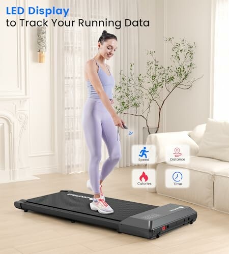 Woman using treadmill with LED display for fitness tracking in a living room.